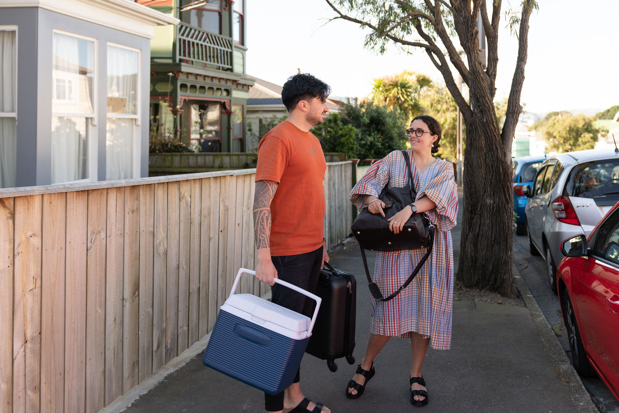 Isabella and her partner standing next to a Mevo in Wellington.