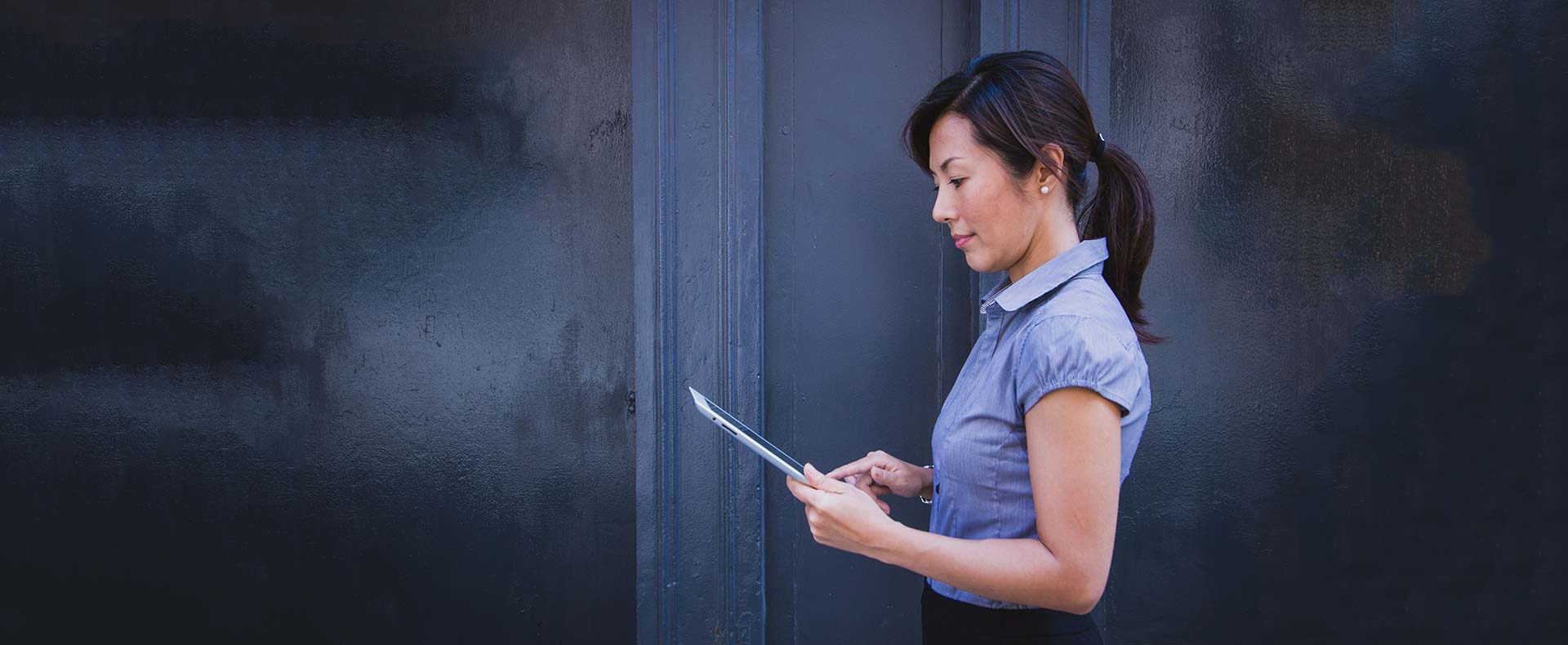 Woman reading from her iPad