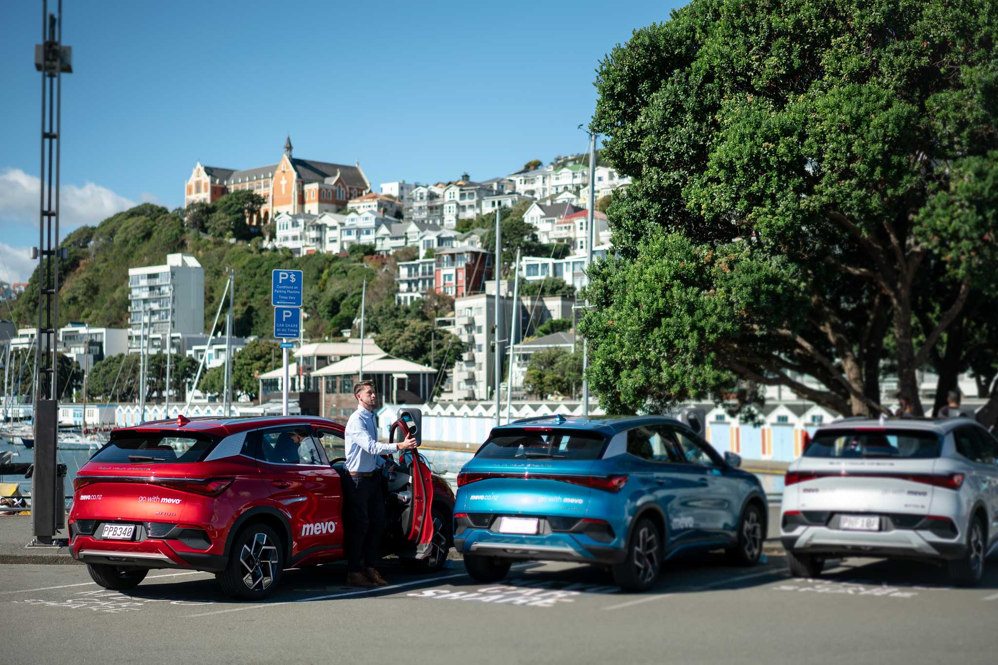 A man steps out of a Mevo car on Clyde Quay